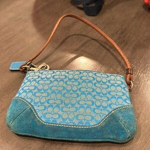 Used turquoise blue wrislet.